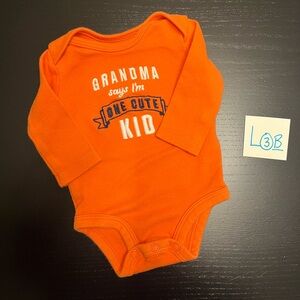 ⭐️2/$5.00⭐️—Orange Bodysuit - Grandma Says I'm One Cute Kid (NB)